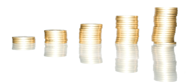 Pound coins stacked in a row